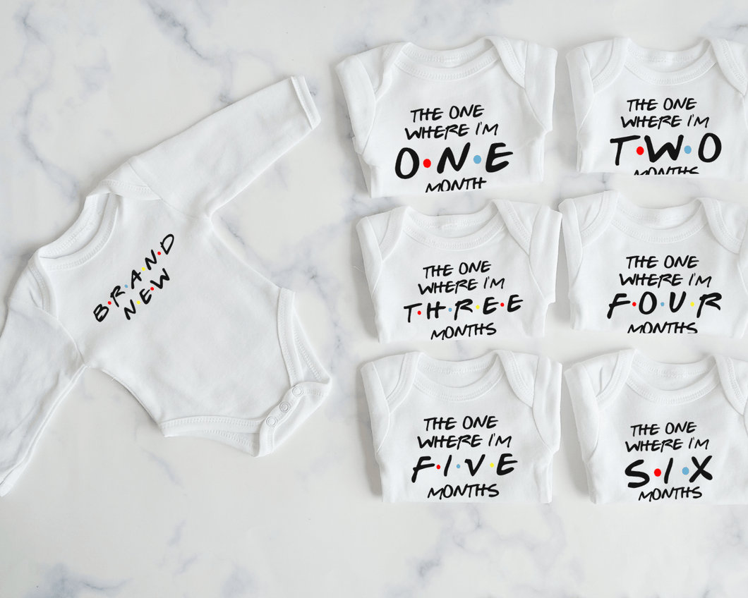 F R I E N D S Monthly Milestone Onesie Set